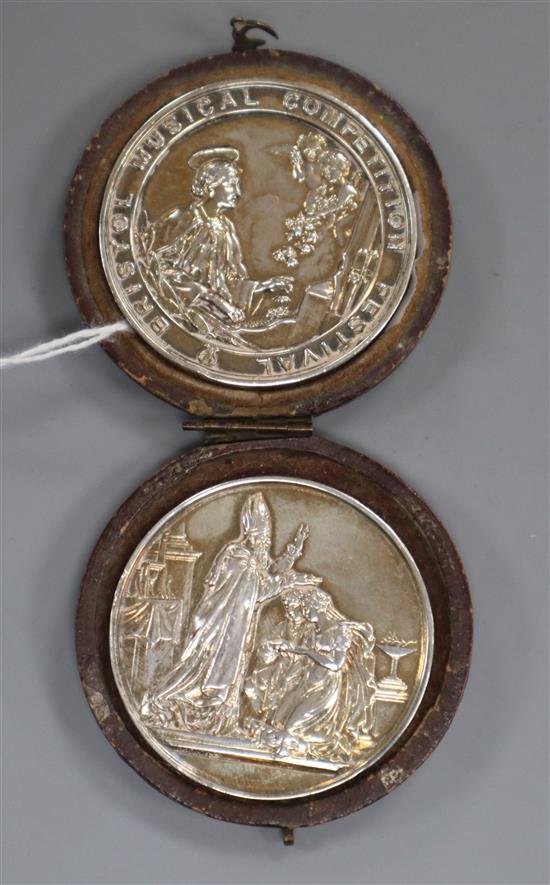 Two late Victorian silver presentation medallions, including a Bristol Musical Competition Festival medallion